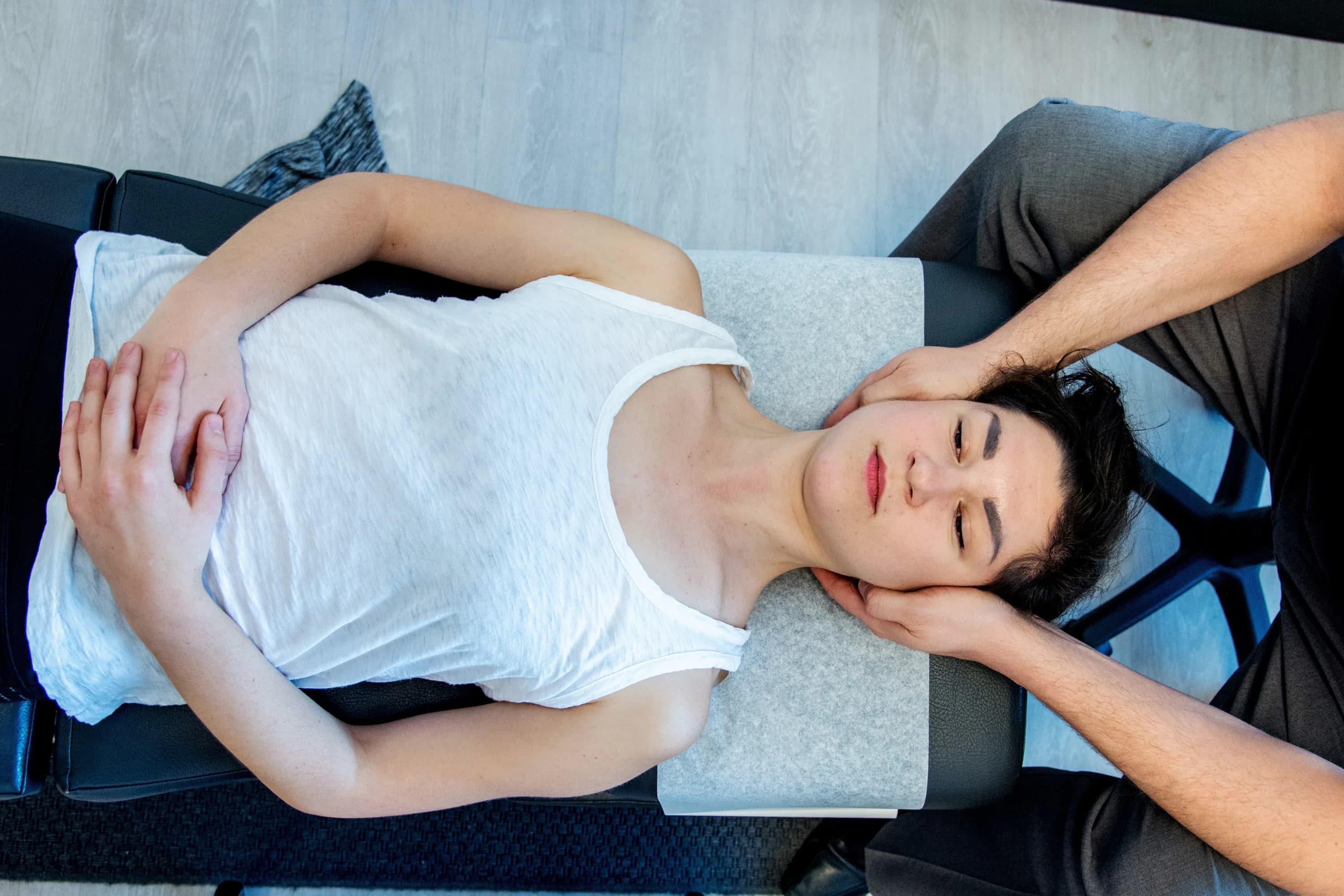 Cervical spine adjustment performed by chiropractor